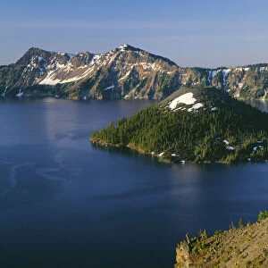 USA, Oregon. Crater Lake National Park, sunrise on Crater Lake and Wizard Island