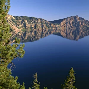 USA, Oregon. Crater Lake National Park, whitebark pines frame view south from Palisade