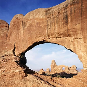 USA, Utah, Arches National Park, Double Arch frames Tunnel arch