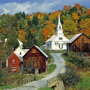 USA, Vermont, Waits River. Fall foliage adds further beauty to the small village
