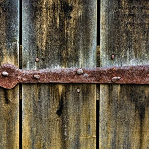 USA, Virginia, Roanoke, Explore Park. Detail of rusty barn door brace. Credit as