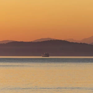 USA, Washington State, Ferry in evening light. Calm Puget Sound