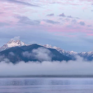 USA, Washington State, Seabeck. Composite of Hood Canal and Olympic Mountains at sunrise