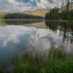 USA, Wyoming. Clouds reflected in Sylvan Lake, Yellowstone National Park USA, Wyoming. Clouds reflected in Sylvan Lake, Yellowstone National Park