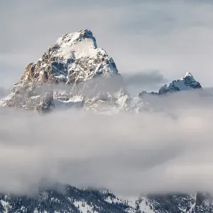 USA, Wyoming, Grand Teton National Park, Jackson. Grand Teton and Mount Owen above the clouds USA, Wyoming, Grand Teton National Park, Jackson. Grand Teton and Mount Owen above the clouds