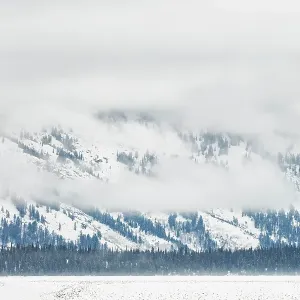 USA, Wyoming, Grand Teton National Park, Jackson. The Teton Range enshrouded in clouds USA, Wyoming, Grand Teton National Park, Jackson. The Teton Range enshrouded in clouds