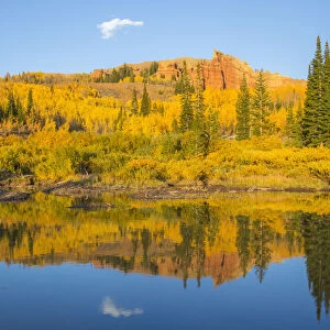 USA, Wyoming, Sublette County. The Red Cliffs in the Wyoming Range mountains is reflected