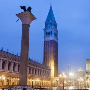 Venezian Lion Statue and the Campanile early Morning. Venice. Italy