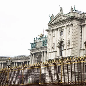 Vienna, Austria - Low angle view of an old world building surrounded by and ornate