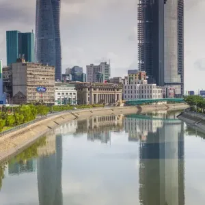 Vietnam, Ho Chi Minh City, city view with Bitexco Tower along the Ben Nghe Canal Vietnam, Ho Chi Minh City, city view with Bitexco Tower along the Ben Nghe Canal
