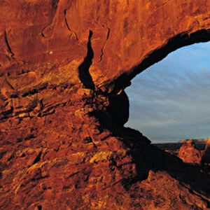 View through natural rock window, Utah, USA