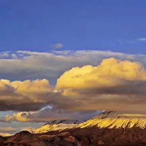 Vulcano Parinacota (6342m) and Pomerape (6286m) Chile during sunset are part of the