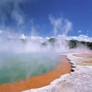 Wai-O-Tapu Thermal Area, steam rising from Champagne Pool, North Island of New Zealand