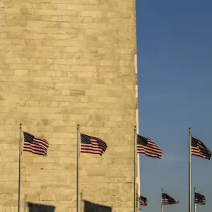 Washington, DC. Washington Monument and two lines of American Flags Washington, DC. Washington Monument and two lines of American Flags