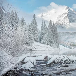 Winter comes to the maroon bells near Aspen Colorado in the Rocky Mountains
