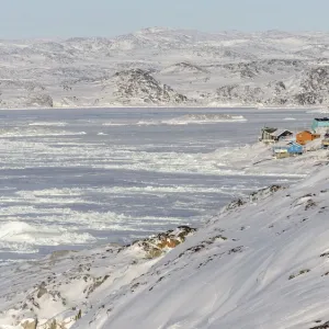 Winter in Ilulissat on the shore of Disko Bay. Greenland, Denmark Winter in Ilulissat on the shore of Disko Bay. Greenland, Denmark
