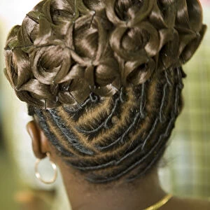 Womans elaborate hair style (viewed from behind), Garifuna Settlement Day, annual