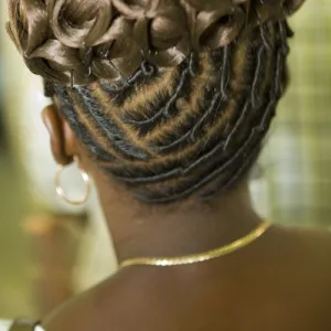 Womans elaborate hair style (viewed from behind), Garifuna Settlement Day, annual