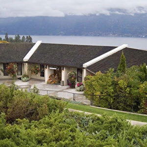 The wood-shingle roofed Grey Monk Estate Winery sits on the steep hills that slope