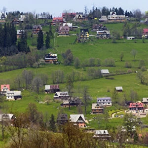 Zakopane nestled in the Tatra Mountains with farmlands, Poland