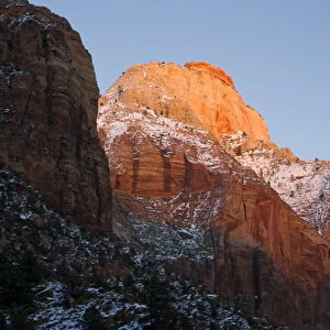 Zion National Park, Utah. USA. Light of winter sunset on East Temple. Zion Canyon