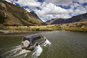 Images Dated 5th January 2012: 4WD crossing the Mararoa River, near Mavora Lakes, Southland, South Island, New Zealand