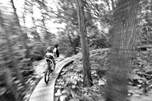 Black and White Gallery: Aaron Rodgers mountain biking on the Stairway to Heaven Trail in Copper Harbor Michigan