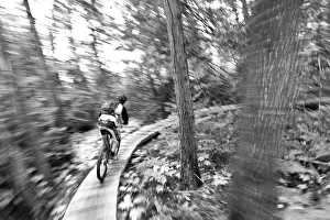 Adventure Prints: Aaron Rodgers mountain biking on the Stairway to Heaven Trail in Copper Harbor Michigan