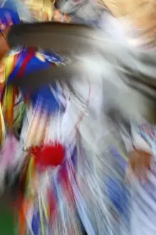 Images Dated 15th July 2007: Abstract motion view of colorfully dressed Native American Indian dance, Montana