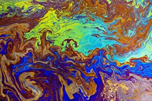 Images Dated 2nd January 2022: Abstract pattern in oil spilled in small stream, Costa Rica