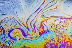 Abstract pattern of refracted light in soap bubble