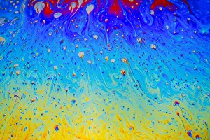 Abstract pattern of refracted light in soap bubble