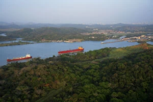 aerial image of ship in the Panama Canal, close to the Miraflores and Pedro Miguel