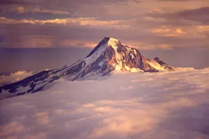 Aerial of Mt. Hood poking through clouds, Oregon