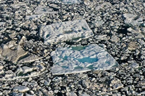 Aerial of multi-layer ice (fresh water pans formed over years and years where the