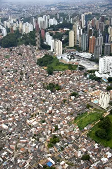Images Dated 17th January 2007: Aerial view of crowded favela housing contrasts with modern apartment buildings in Sao Paulo