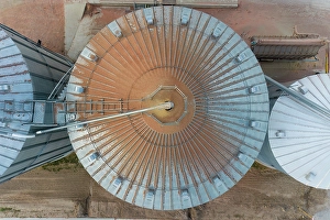 Images Dated 26th June 2024: Aerial view of a grain bin with corn dust, Marion County, Illinois