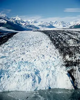 Water Feature Prints: Aerial view of Harvard Glacier as if flows out of the Chugach Mountains in Chugach National Forest