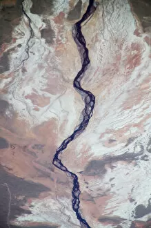 Aerial view of river going through the desert in North Chile