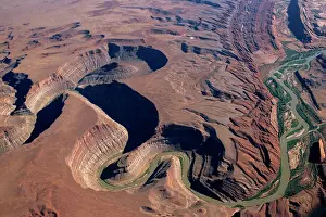James Kay Prints: Aerial view of the San Juan River cutting through Raplee Anticline west of the town of Bluff