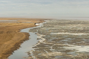 Images Dated 23rd June 2006: aerial view of spring ice breakup along the coast east of Point Barrow, National Petroleum Reserves