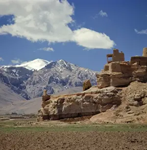 Afghanistan Prints: Afghanistan, Bamian Valley. The ruins of a lookout languish above pastures in the Bamian Valley