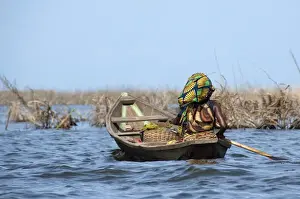 One Person Prints: Africa, Benin, Ganvie. Tofinu tribe village on the waters of Lake Nokoue