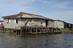 West Africa Prints: Africa, Benin, Ganvie. typical Tofinu village home on stilts over the waters of Lake Nokoue