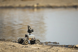 Images Dated 18th June 2014: Africa, Botswana, Chobe National Park, Remote camera rover positioned by water hole