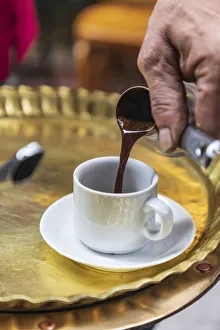 Coffee Prints: Africa, Egypt, Cairo. Egyptian coffee being served traditionally at a coffee shop in
