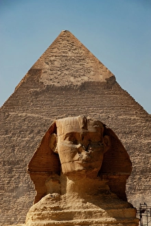 Images Dated 8th April 2024: Africa, Egypt, Giza. Classic view of the Sphinx and one of the great Pyramids of Giza
