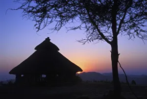 Images Dated 2nd November 2011: Africa, Ethiopia, Omo river region, Sunset over a traditional Konso hut