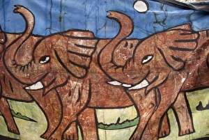 Africa, Gambia. Capital city of Banjul. Local batik workshop, elephant textile