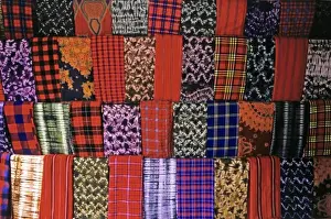 Mara Prints: Africa, Kenya, Msai Mara. A colorful display of fabrics and cloth of the Msai